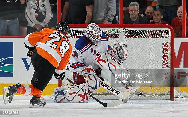 Claude Giroux of the Philadelphia Flyers buries the game winning shootout goal past Henrik Lundqvist of the New York Rangers on April 11, 2010 at...
