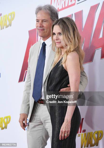 David E. Kelley and Michelle Pfeiffer attend the premiere of Disney And Marvel's "Ant-Man And The Wasp" at the El Capitan Theater on June 25, 2018 in...