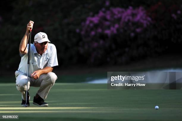 Fred Couples lines up a putt on the 13th green during the final round of the 2010 Masters Tournament at Augusta National Golf Club on April 11, 2010...