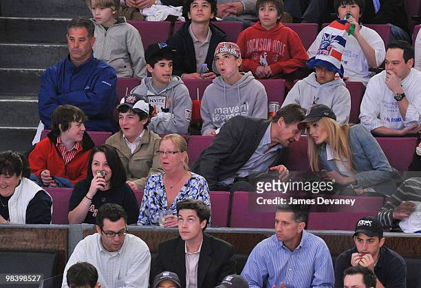Daniel Neeson, Michael Neeson, Liam Neeson and Jennifer Ohlsson attend a game between the Philadelphia Flyers and the New York Rangers at Madison...
