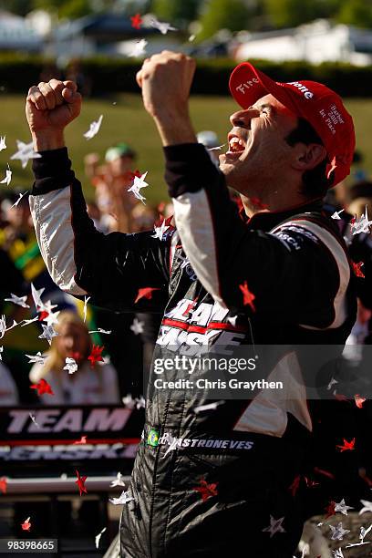 Helio Castroneves of Brazil, driver of the Team Penske Dallara Honda celebrates after winning the IRL IndyCar Series Grand Prix of Alabama at Barber...