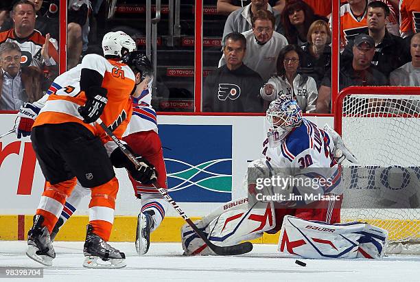 Matt Carle of the Philadelphia Flyers pounces on a rebound from Henrik Lundqvist of the New York Rangers to score a game tying goal in the third...