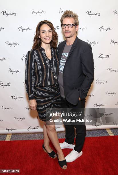 Annie Parisse and Paul Sparks attend the opening night performance of the Playwrights Horizons world premiere production of 'Log Cabin' on June 25,...