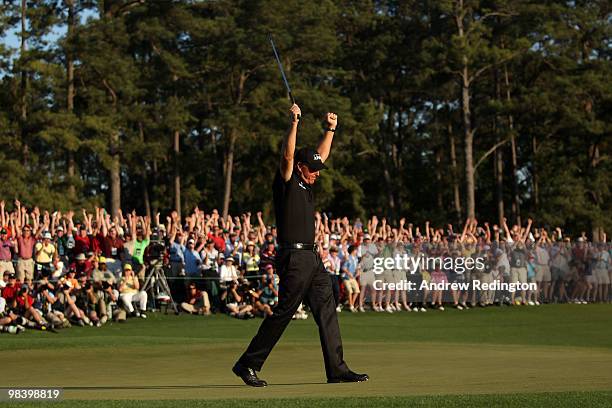 Phil Mickelson celebrates his three-stroke victory after winning the 2010 Masters Tournament at Augusta National Golf Club on April 11, 2010 in...