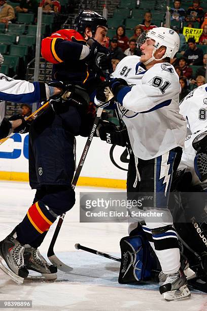 Shawn Matthias of the Florida Panthers shoves Steven Stamkos of the Tampa Bay Lightning at the BankAtlantic Center on April 11, 2010 in Sunrise,...