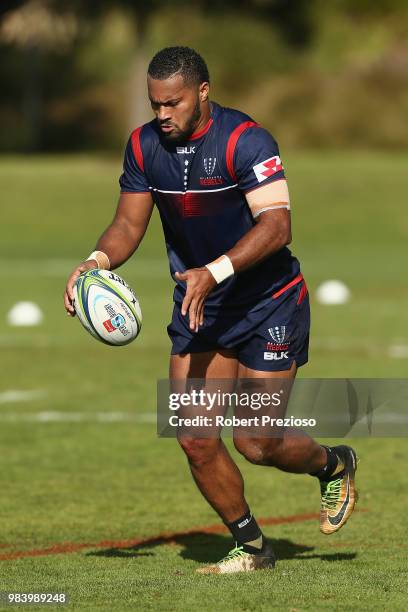 Sefanaia Naivalu kcks during a Melbourne Rebels Super Rugby training session at AAMI Park on June 26, 2018 in Melbourne, Australia.