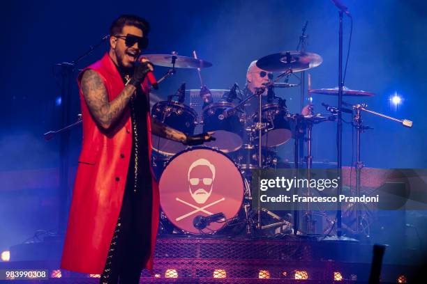 Adam Lambert and Roger Taylor of Queen perform on stage at Mediolanum Forum on June 25, 2018 in Milan, Italy.