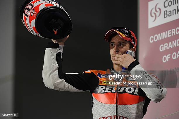 Andrea Dovizioso of Italy and Repsol Honda Team takes third place in the MotoGP of Qatar at the Losail Circuit on April 11, 2010 in Doha, Qatar.
