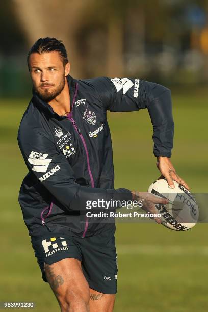 Sandor Earl offloads the ball during a Melbourne Storm NRL media opportunity at Gosch's Paddock on June 26, 2018 in Melbourne, Australia.