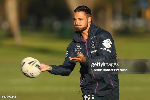 Sandor Earl offloads the ball during a Melbourne Storm NRL media opportunity at Gosch's Paddock on June 26, 2018 in Melbourne, Australia.
