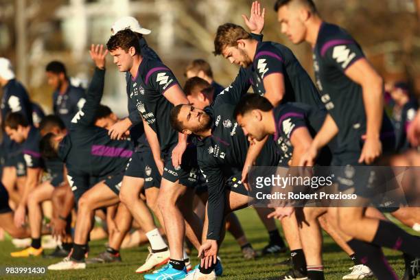 Players warm up during a Melbourne Storm NRL media opportunity at Gosch's Paddock on June 26, 2018 in Melbourne, Australia.