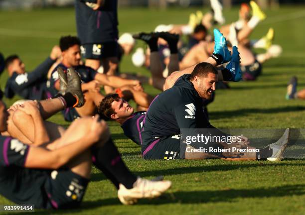 Players warm up during a Melbourne Storm NRL media opportunity at Gosch's Paddock on June 26, 2018 in Melbourne, Australia.