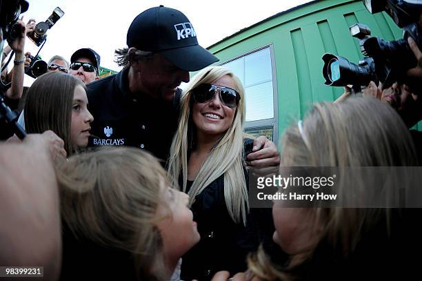 Phil Mickelson celebrates with his wife Amy and children Amanda, Evan and Sophia after his three-stroke victory after winning the 2010 Masters...