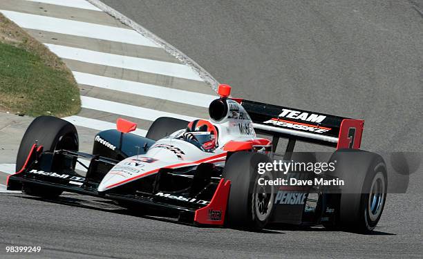 Helio Castroneves of Brazil, driver of the Team Penske Dallara Honda races through turn 14 during the Indy Grand Prix of Alabama at the Barber...