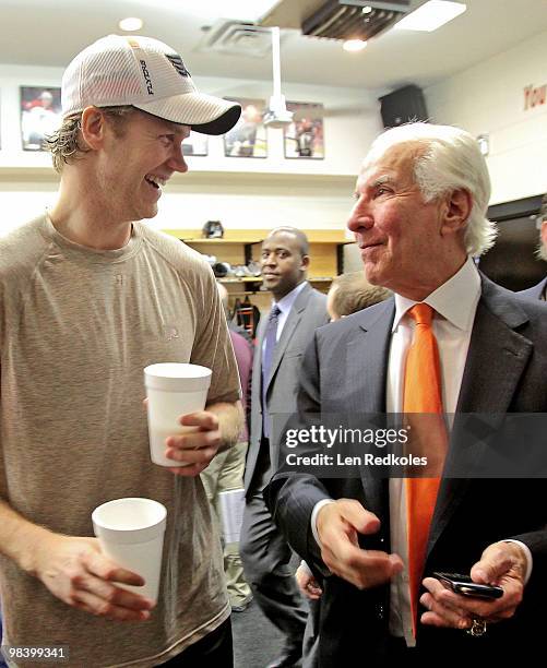 Chris Pronger and Chairman Ed Snider of the Philadelphia Flyers both celebrate advancing into the playoffs after a 2-1 shootout win over the New York...