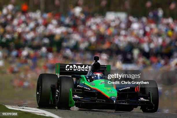 Danica Patrick, driver of the Team GoDaddy.com Andretti Autosport Dallara Honda leads a pack of cars during the IRL IndyCar Series Grand Prix of...