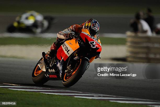Andrea Dovizioso of Italy and Repsol Honda Team heads down a straight during the MotoGP of Qatar at the Losail Circuit on April 11, 2010 in Doha,...