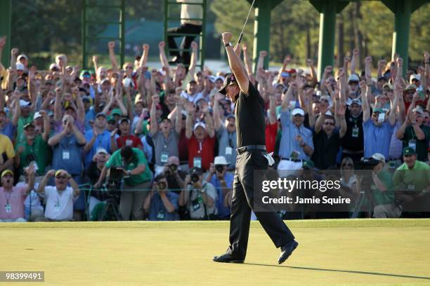 Phil Mickelson celebrates his three-stroke victory after winning the 2010 Masters Tournament at Augusta National Golf Club on April 11, 2010 in...