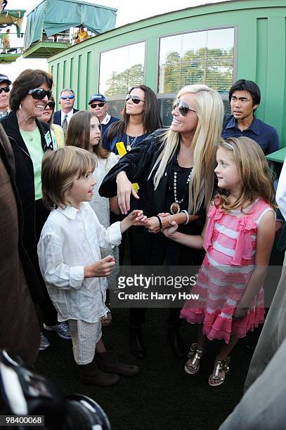 Phil Mickelson's wife Amy , his son Evan , daughter Amanda and daughter Sophia celebrate his three-stroke victory to win the 2010 Masters Tournament...