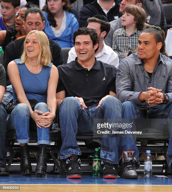 Chloe Sevigny, Mark Sanchez and Dustin Keller attend a game between the Miami Heat and the New York Knicks at Madison Square Garden on April 11, 2010...