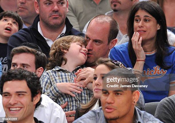Chris Meloni and son attend a game between the Miami Heat and the New York Knicks at Madison Square Garden on April 11, 2010 in New York City.