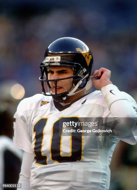 Quarterback Marc Bulger of the West Virginia University Mountaineers looks on from the sideline during a Big East college football game against the...