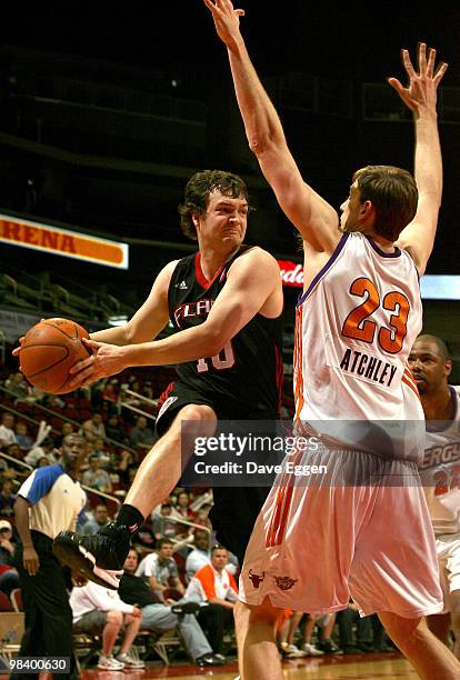 Kevin Kruger of the Utah Flash looks to make a pass around the back of Connor Atchley of the Iowa Energy in the first half of game three of their...