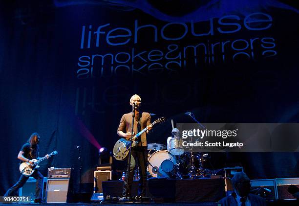 Ben Carey, Jason Wade and Ricky Woolstenhulme Jr of Lifehouse performs at Joe Louis Arena on April 10, 2010 in Detroit, Michigan.