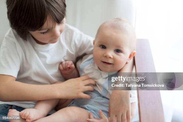 Guy Rocking A Baby 160 Man Rocking Baby Stock Photos, High-Res Pictures, and Images ...