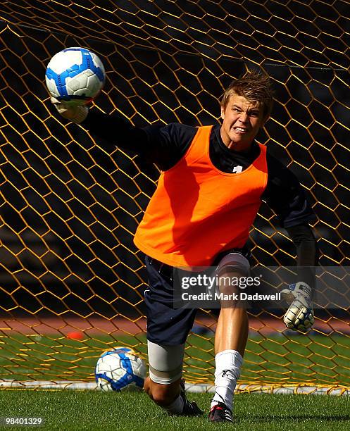 Mitchell Langerak of the Victory throws the ball back in to play during a Melbourne Victory A-League training session at Olympic Park on April 12,...