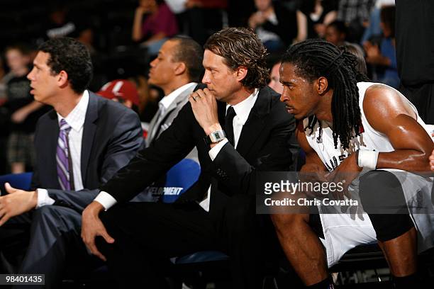 Head coach Quin Snyder and Carldell Johnson of the Austin Toros watch from the bench as their team plays the Dakota Wizards on April 11, 2010 at the...