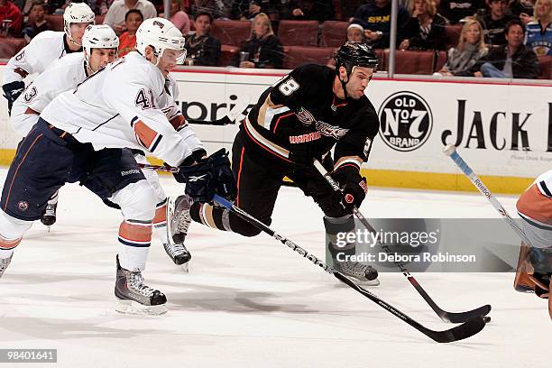 Kyle Chipchura of the Anaheim Ducks drives the puck against Taylor Chorney of the Edmonton Oilers during the game on April 11, 2010 at Honda Center...