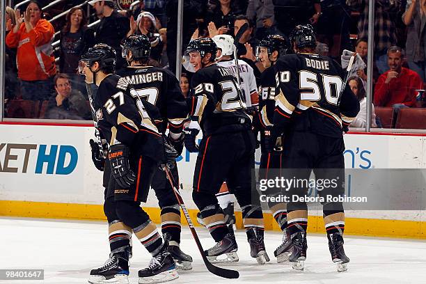 Scott Niedermayer, Steve Eminger, Ryan Carter, Troy Bodie of the Anaheim Ducks celebrate a goal in the third period from Ryan Carter against the...