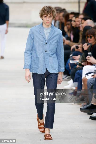 Model walks the runway during the Officine Generale Menswear Spring/Summer 2019 show as part of Paris Fashion Week on June 24, 2018 in Paris, France.