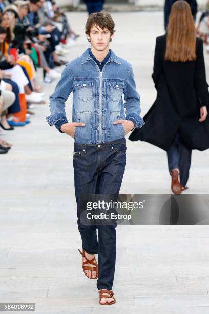 Model walks the runway during the Officine Generale Menswear Spring/Summer 2019 show as part of Paris Fashion Week on June 24, 2018 in Paris, France.