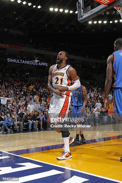 Ronny Turiaf fo the Golden State Warriors yells to the crowd after a successful block against the Oklahoma City Thunder on April 11, 2010 at Oracle...