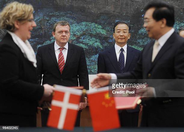 Danish Prime Minister Lars Lokke Rasmussen attends signing ceremony with Chinese premier Wen Jiabao at the Great Hall of the People on April 12, 2010...