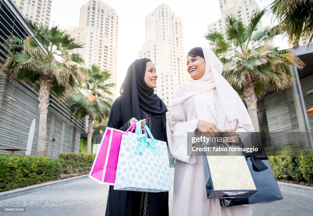 Two arabian girlfriends bonding and having fun
