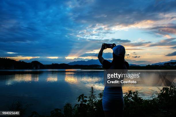 Sunset glow by the shijiang river in xinshao county, shaoyang city, hunan province, China, on the evening of June 25, 2018.