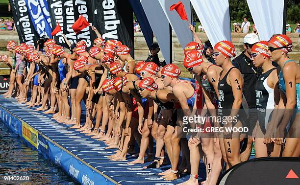 Competitors prepare for the start of the swim leg of the women's event at the Sydney round of the ITU World Championship Triathlon Series elite on...