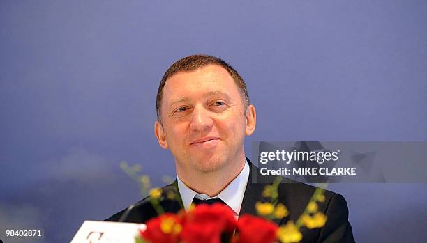 Oleg Deripaska, CEO of Russian metals giant UC Rusal, smiles during a press conference to announce the company's 2009 annual results in Hong Kong on...