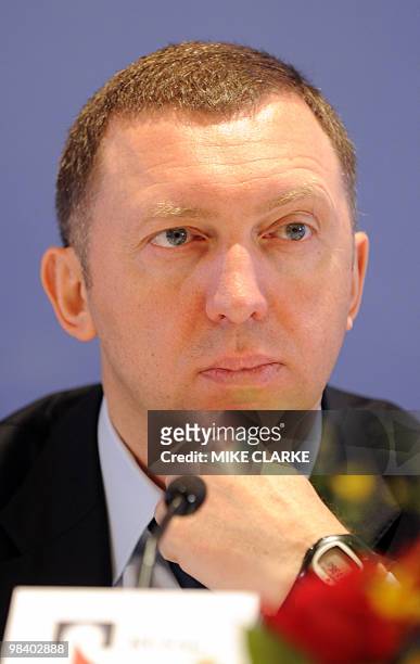 Oleg Deripaska, CEO of Russian metals giant UC Rusal, listens during a press conference to announce the company's 2009 annual results in Hong Kong on...
