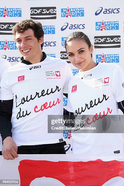 Valerie Begue and Taig Khris pose for the 'Mecenat Chirurgie Cardiaque' association after their Paris marathon's run on April 11, 2010 in Paris,...