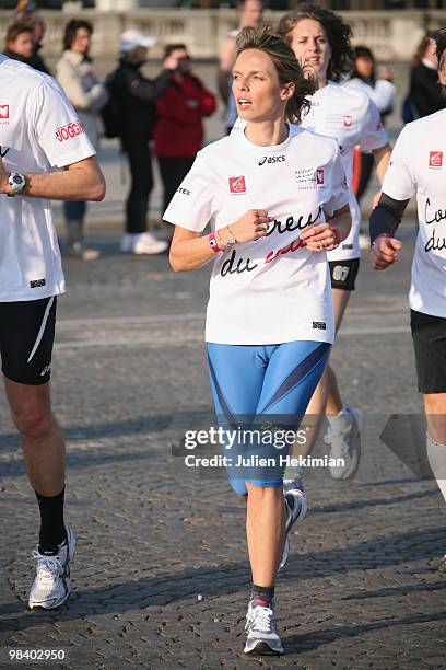 Sylvie Tellier runs for the 'Mecenat Chirurgie Cardiaque' association during the Paris marathon on April 11, 2010 in Paris, France.