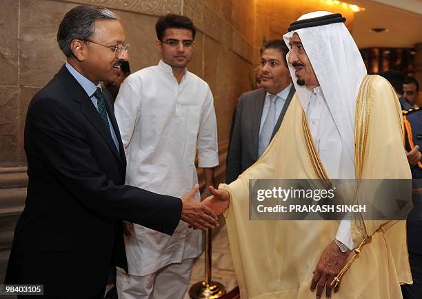 Riyadh Governor Prince Salman bin Abdul Aziz Al-Saud of Saudi Arabai shakes hands with former Federation of Indian Chambers of Commerce and Industry...