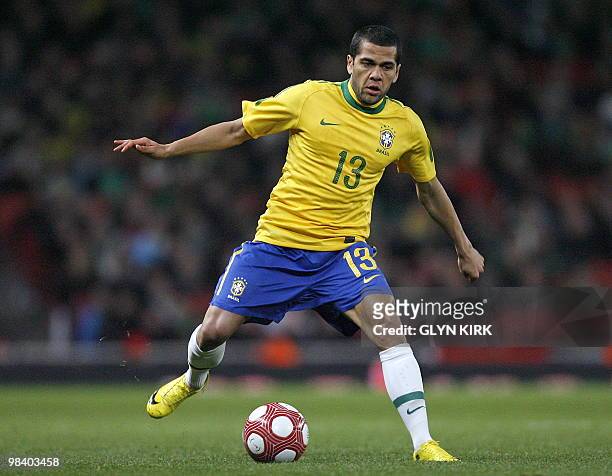 Brazilian defender Daniel Alves in action during the international friendly football match against Republic of Ireland on March 2, 2010 at the...