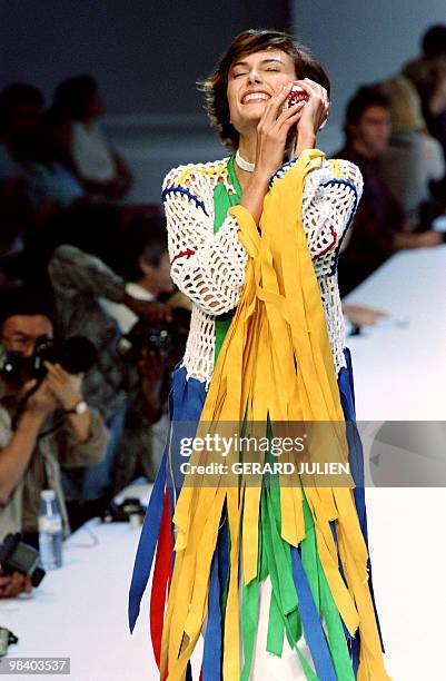 French model Ines de la Fressange presents a creation by French designer Jean-Charles de Castelbajac during the spring-summer 1995/1996 ready-to-wear...