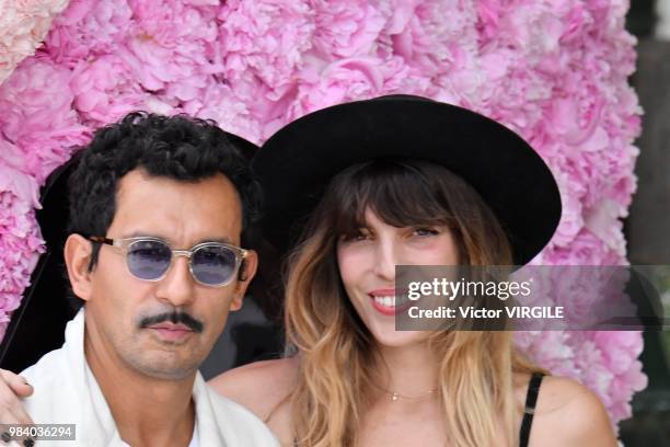 Haider Ackermann and Lou Doillon during the Dior Homme Menswear Spring/Summer 2019 fashion show as part of Paris Fashion Week on June 23, 2018 in...