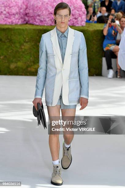 Model walks the runway during the Dior Homme Menswear Spring/Summer 2019 fashion show as part of Paris Fashion Week on June 23, 2018 in Paris, France.