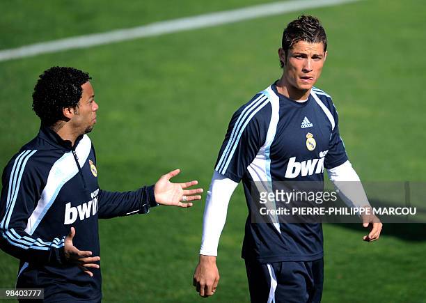 Real Madrid's football club Brazilian defender Marcelo and Portuguese forward Cristiano Ronaldo attend a training session in Madrid on April 12,...
